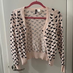 Blush Pink and black buttoned down cardigan.